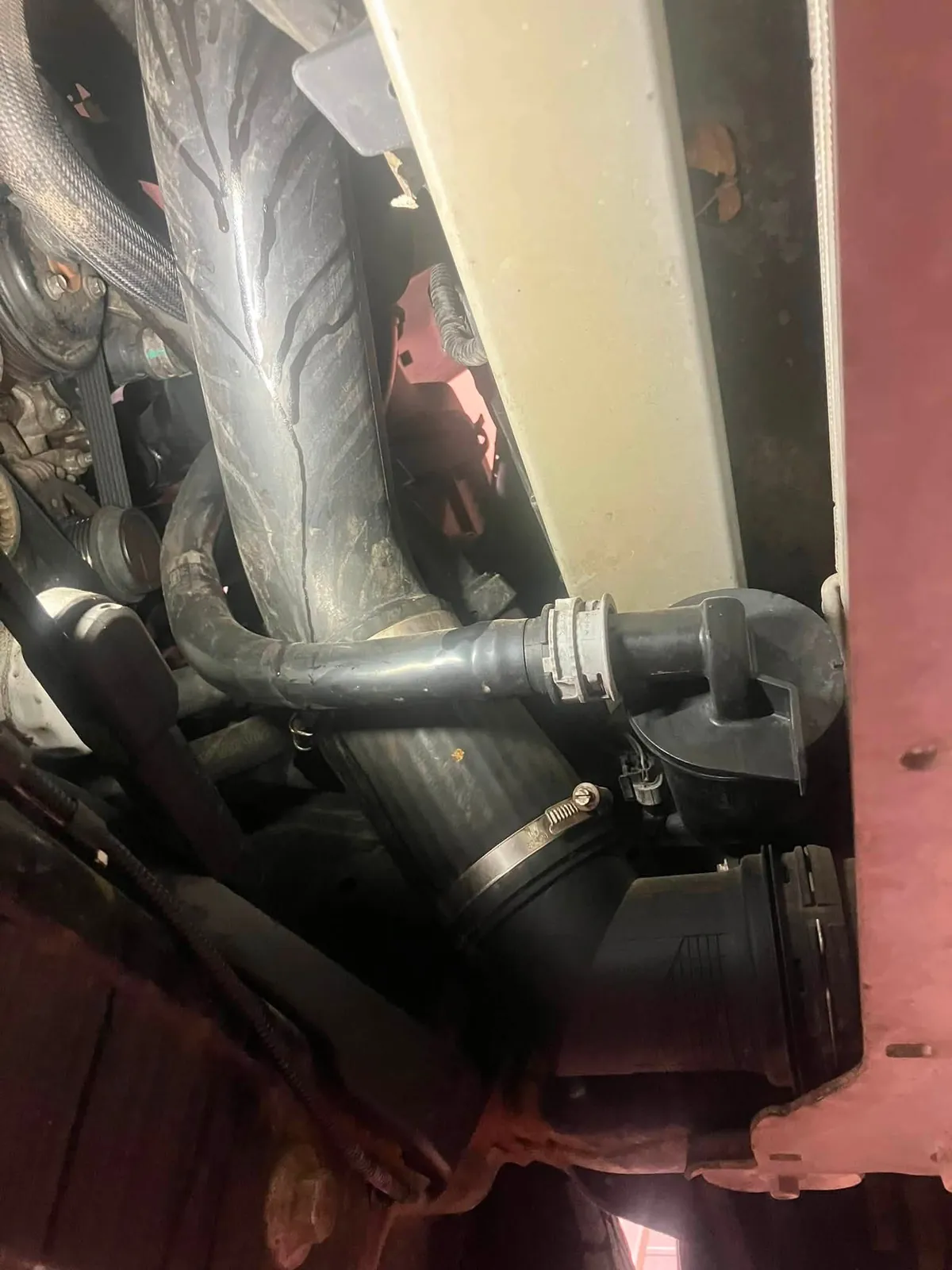 Engine work in progress — belt and pulley service.