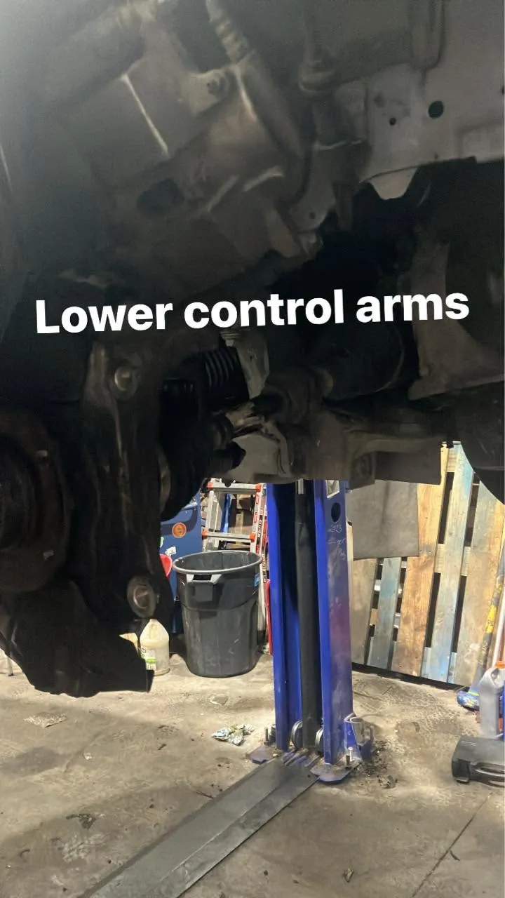 Under-car work — lower control arm service (Daniel's annotated photo).